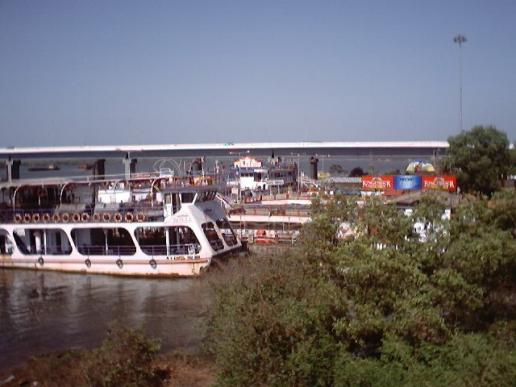 River cruise beneath Mandovi bridges